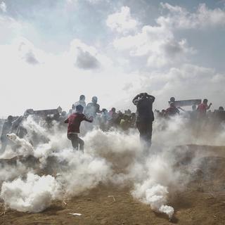 Des manifestants palestiniens sur la bande de Gaza. [Keystone - Mohammed Saber]