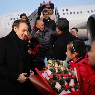 L'arrivée du président français Emmanuel Macron à Pékin le 8 janvier. [AFP - Ludovic Marin]
