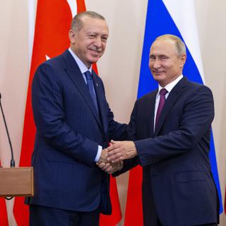 Recep Tayyip Erdogan et Vladimir Poutine. [Keystone - EPA/Alexander Zemlianichenko/pool]