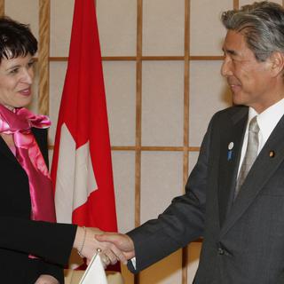 La Suisse et le Japon avaient signé un accord de libre-échange à Tokyo en février 2009. [AP/Keystone - Shizuo Kambayashi]