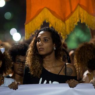 Anielle Silva (centre) lors d'une manifestation en mars dernier à Rio. [AFP - Mauro Pimentel]