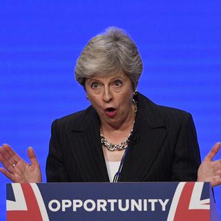 La Première ministre britannique Theresa May s'adresse au délégués lors du troisième jour de conférence du Parti conservateur britannique. [Neil Hall - EPA/Keystone]