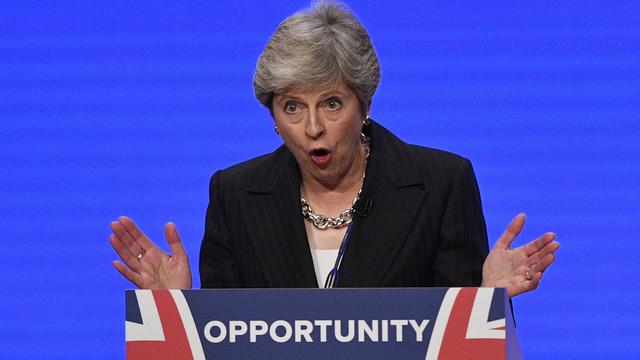 La Première ministre britannique Theresa May s'adresse au délégués lors du troisième jour de conférence du Parti conservateur britannique. [Neil Hall - EPA/Keystone]