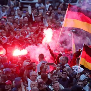Le rassemblement de Chemnitz était organisé par le mouvement Pegida. [DPA/Keystone - Jan Woitas]
