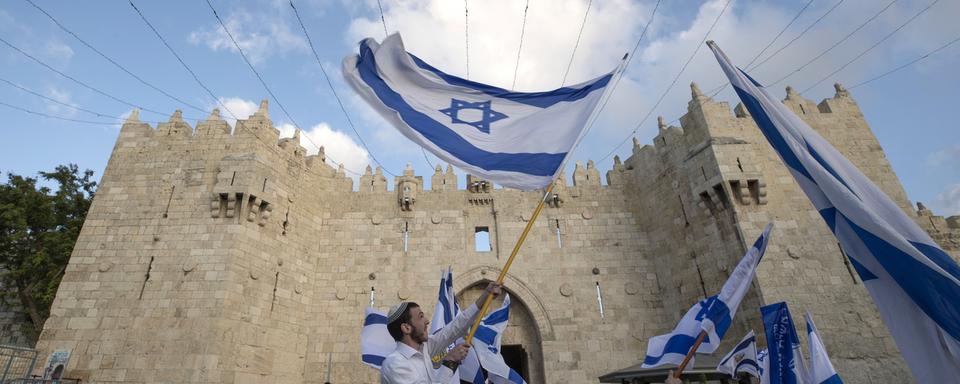 Des Israélien à Jérusalem dimanche. [EPA/Keystone - Atef Safadi]