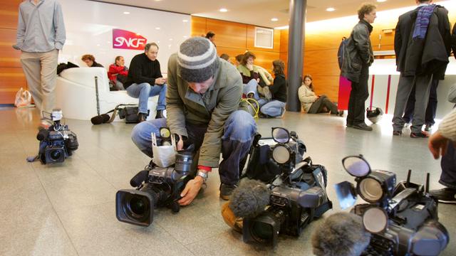 Les médias et la grève de la SNCF. [AFP - Joël Saget]