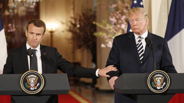 Emmanuel Macron et Donald Trump lors de leur conférence de presse conjointe. [Keystone - EPA/Shawn Thew]