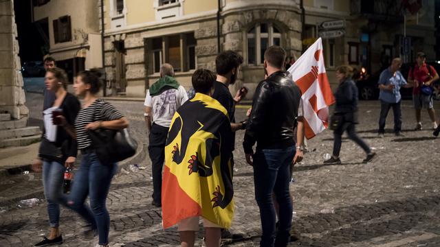 Partisans et opposants au rattachement de Moutier n'ont pas fini d'en découdre. [Keystone - Jean-Christophe Bott]