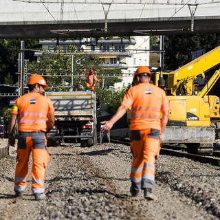 Quelque 600 ouvriers sont mobilisés pour les travaux sur la ligne ferroviaire entre Lausanne et Puidoux. [Keystone]