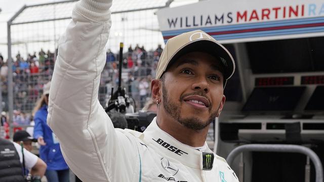 Lewis Hamilton a le sourire après son nouveau titre mondial. [Darren Abate]