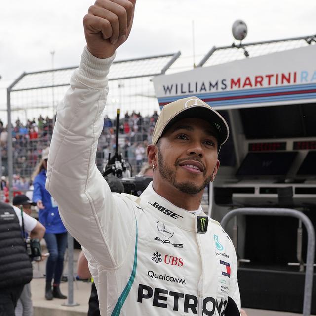 Lewis Hamilton a le sourire après son nouveau titre mondial. [Darren Abate]
