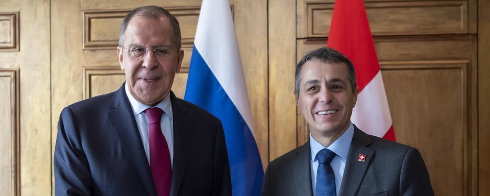 Le ministre des Affaires étrangères russe Sergueï Lavrov et le conseiller fédéral Ignazio Cassis ont affiché une volonté d'appaisement entre la Suisse et la Russie. [Keystone - Martial Trezzini]