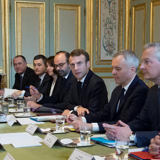 Emmanuelle Macron aux côtés d'Edouard Philippe et Bruno Le Maire. [Reuters - Ian Langsdon]