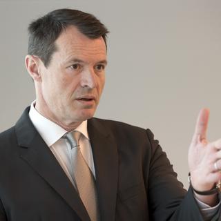 Guy Lachapelle quitte la direction de la Banque cantonale de Bâle pour la présidence de Raiffeisen. [Keystone - Georgios Kefalas]