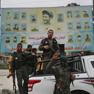 Des membres de L'appel des Unités de protection du peuple (YPG), la principale milice kurde de Syrie. [AP/Keystone - Hussein Malla]