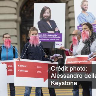 Des femmes à barbes pour dénoncer l’inégalité salariale. [Keystone - Alessandro della Valle]