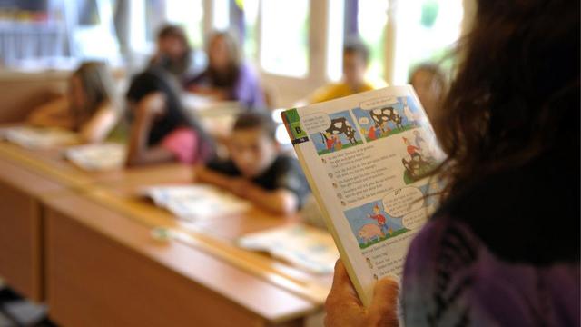 L'arrêt du Tribunal fédéral impose la gratuité du matériel scolaire. [Keystone - Georgios Kefalas]