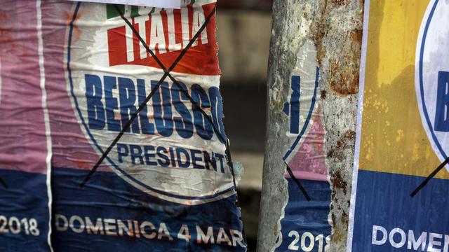 Affiches électorales pour les législatives italiennes qui ont eu lieu le 4 mars 2018. [keystone - Gregorio Borgia]