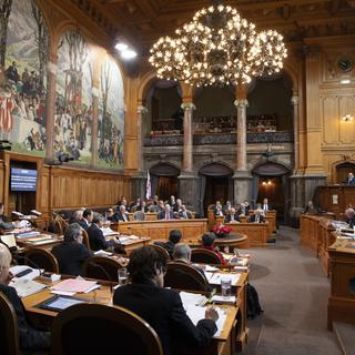 Les parlementaires débattent durant la session d'hiver, le 29.11.2018. [Keystone - Anthony Anex]