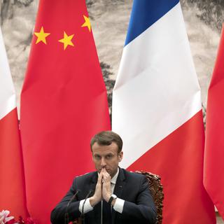 La visite d'Emmanuel Macron en Chine était très attendue. [AP Photo/Keystone - Mark Schiefelbein]