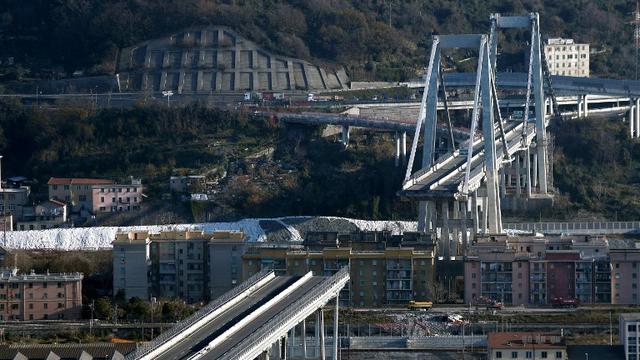 Le pont Morandi s'est écroulé le 14 août. Quatre mois plus tard, place à l'inauguration de sa démolition. Toute une symbolique pour l'Italie. [AFP - Filippo MONTEFORTE]