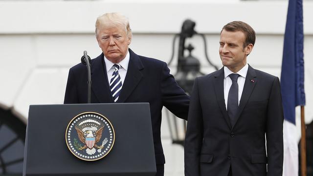 Donald Trump et Emmanuel Macron. [EPA/Keystone - Erik S. Lesser]