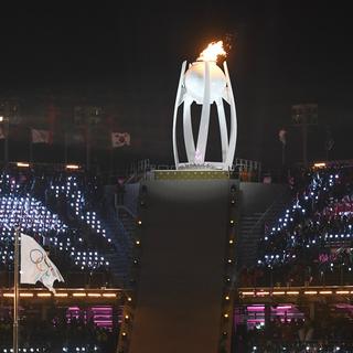 La flamme olympique, durant la cérémonie d'ouverture des JO de PyeongChang. [Keystone - Daniel Kopatsch]
