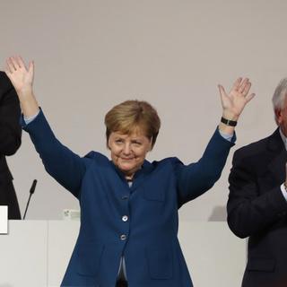 Angela Merkel a été ovationnée par les délégués de la CDU. [afp - Odd Andersen]