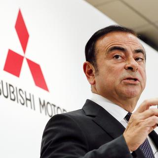 Carlos Ghosn avait volé au secours de Mitsubishi en 2016, au moment où le constructeur japonais était fragilisé par un scandale de falsification des données. [EPA/Keystone - Kimimasa Mayama]