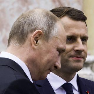 Vladimir Poutine et Emmanuel Macron (ici, à Versailles en mai 2017). [Pool/Reuters - Etienne Laurent]