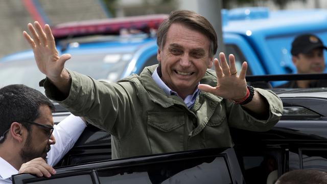 Le président élu brésilien Jair Bolsonaro a multiplié les annonces depuis une semaine. [AP/Keystone - Silvia izquierdo]