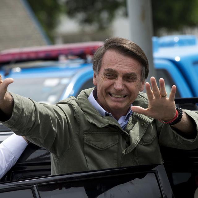 Le président élu brésilien Jair Bolsonaro a multiplié les annonces depuis une semaine. [AP/Keystone - Silvia izquierdo]