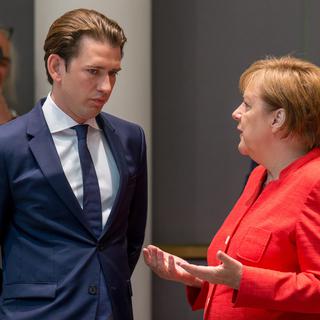 Le chancelier autrichien Sebastian Kurz et son homologue allemande Angela Merkel (image d'archive). [Keytone - Stephanie Lecocq]