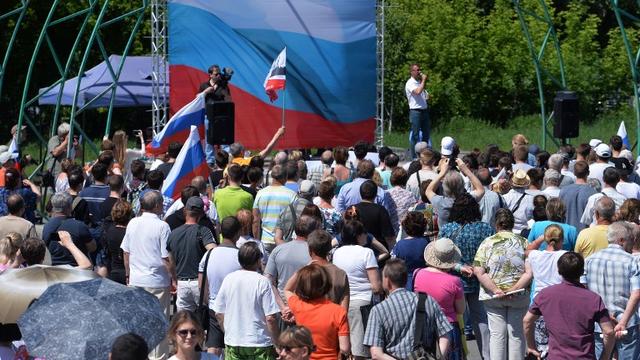 Des manifestants protestant contre la réforme des retraites russe à Tcheliabinsk. [AFP - Aleksandr Kondratuk / Sputnik]