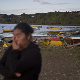 Les pêcheurs de l'île de Chiloé sont particulièrement touchés par la nouvelle loi chilienne. [AP/Keystone - Esteban Felix]