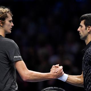Alexander Zverev et Novak Djokovic. [Reuters - Tony O'Brien]