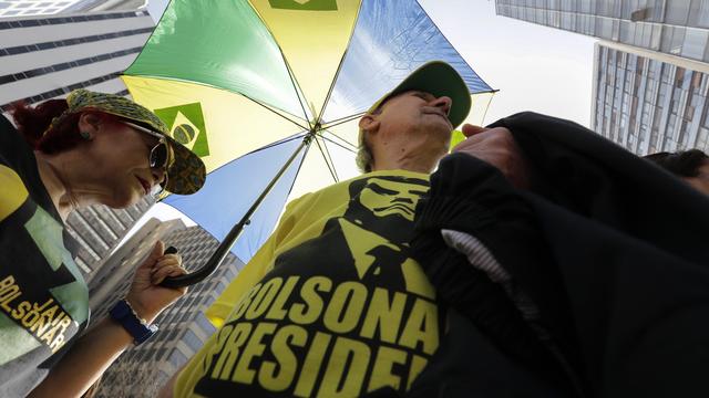 Des partisans du candidat du Parti social-libéral Jaïr Bolsonaro, réunis à Sao Paulo. [EPA - Sebastiao Moreira]