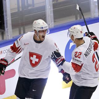 Après sa victoire contre la Finlande, l'équipe de Suisse affrontera le Canada en demi-finale des Championnats du monde de hockey sur glace. [Keystone - Salvatore Di Nolfi]