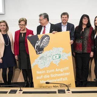 Bernhard Guhl (PBD-AG), Christa Markwalder (PLR-BE), Edith Graf-Litscher (PS-TG), Filippo Lombardi (PDC-TI), Jürg Grossen (Vert'libéraux-BE), Marianne Streiff (PEV-BE), Adèle Thorens Goumaz (Les Verts-VD) et Roland Eberle (UDC-TG), de gauche à droite. [Keystone - Peter Schneider]