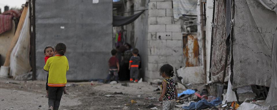 Des jeunes réfugiés palestiniens dans un camp de la bande de Gaza (photo prétexte). [EPA/Keystone - Mohammed Saber]