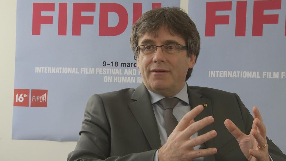 Carles Puigdemont répond aux questions de la presse au FIFDH. [RTS - DR]