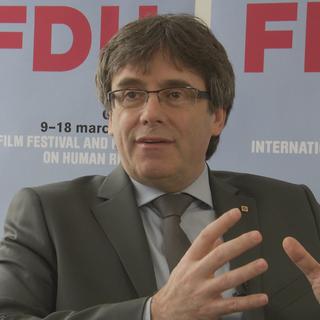 Carles Puigdemont répond aux questions de la presse au FIFDH. [RTS - DR]