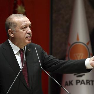 Le président turc Recep Tayyip Erdogan s'est adressé vendredi à des responsables du parti au pouvoir AKP, à Ankara. [Yasin Bulbul - Pool Photo via AP]