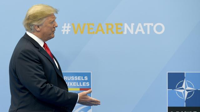 Donald Trump arrivant au sommet de l'OTAN, le 11 juillet 2018 à Bruxelles. [EPA/Keystone - Christian Bruna]