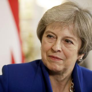 La première ministre britannique Theresa May ne devrait pas être en mesure de réunir son gouvernement lundi pour approuver un texte sur le Brexit selon la presse britannique. [Matt Dunham]