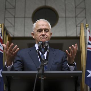 Le Premier ministre australien promet de "ne pas céder à l'intimidation". [AAP/AP/Keystone - Lukas Coch]