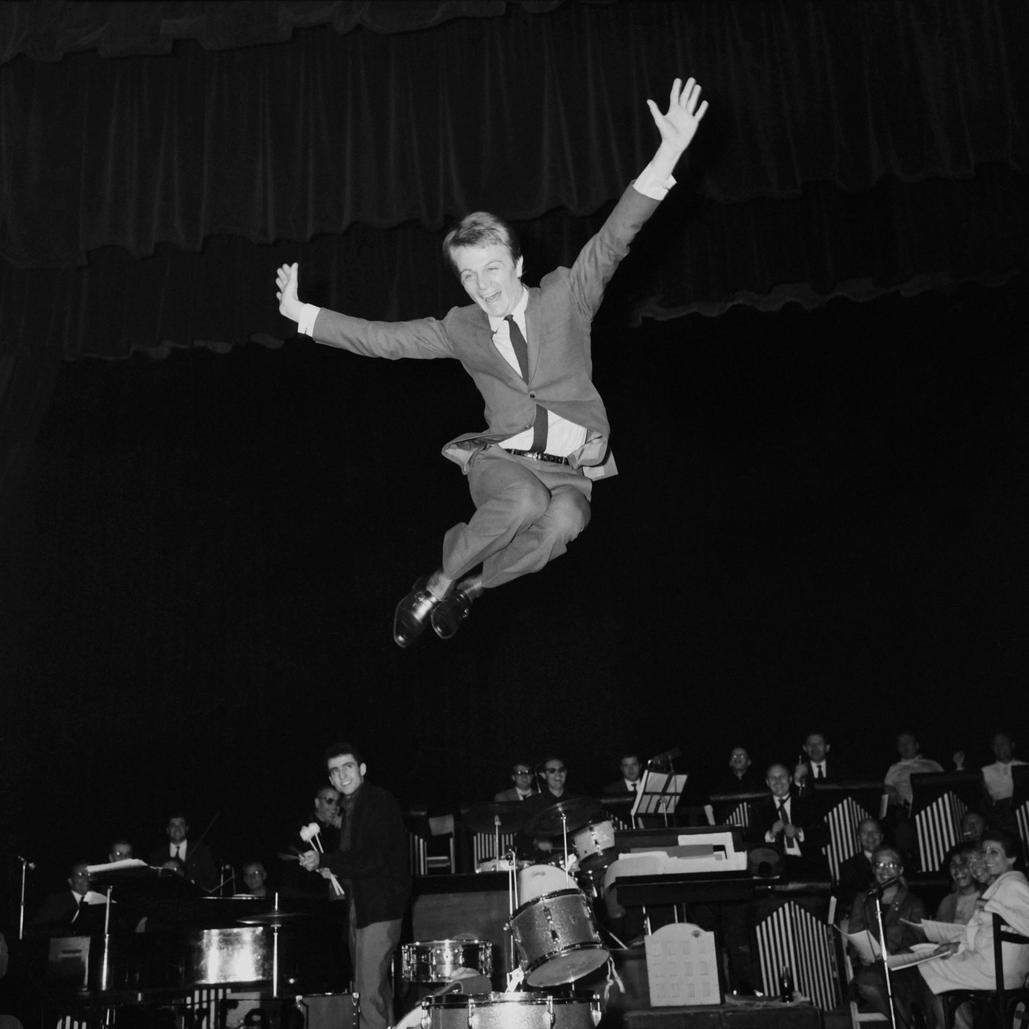 Le chanteur français Claude François lors d'un concert en 1964. [AFP - NB]