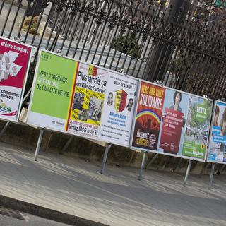 Des affiches électorales des partis politiques genevois en 2011 (photo prétexte). [Keystone - Salvatore Di Nofli]