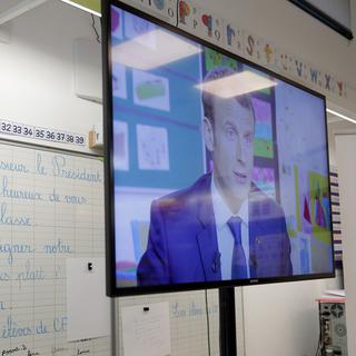 Emmanuel Macron lors de son passage dans le journal de 13h de TF1. [AP/Keystone - Yoan Valat]