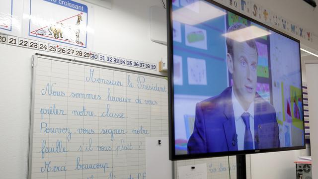 Emmanuel Macron lors de son passage dans le journal de 13h de TF1. [AP/Keystone - Yoan Valat]